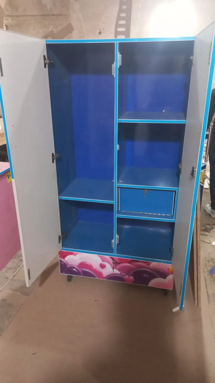 Blue Wardrobe Interior with Shelves