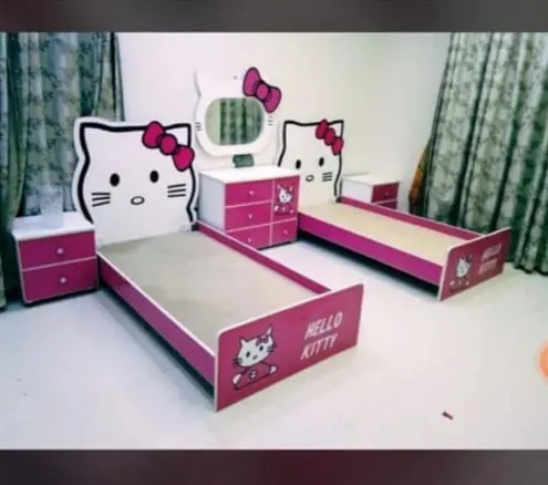Pair of Pink Single Beds with Matching Furniture