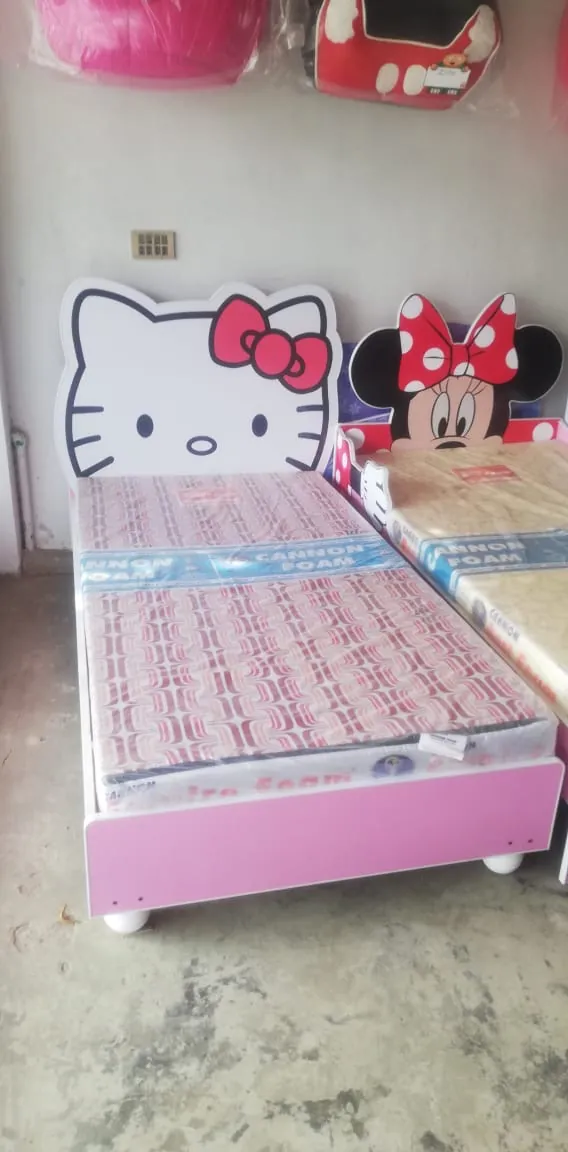 Pink Single Bed with Cat Headboard